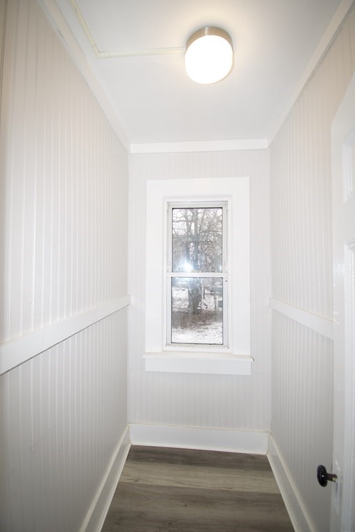 72 Malden Street Springfield, MA 01108 - Photo 13 of 25 wooden floor in an empty room with a window
