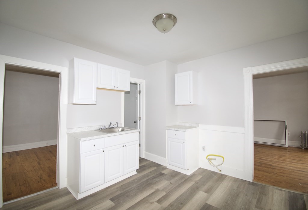 72 Malden Street Springfield, MA 01108 - Photo 15 of 25 a view of kitchen with wooden floor