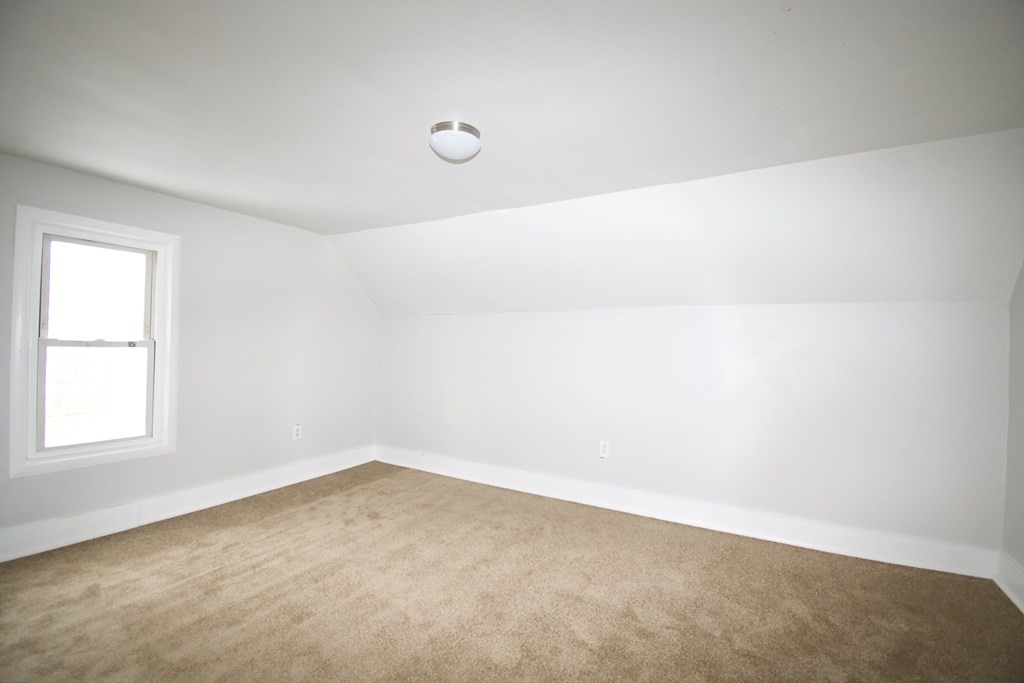 72 Malden Street Springfield, MA 01108 - Photo 23 of 25 an empty room with a window