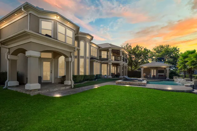 a view of a building with a yard