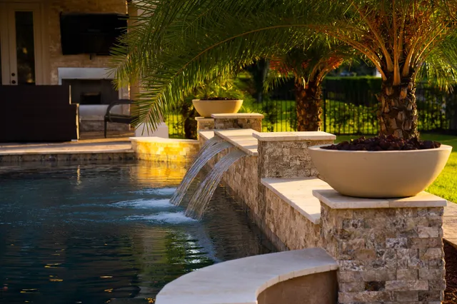 a view of a swimming pool with a patio