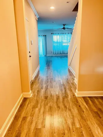a view of livingroom with wooden floor
