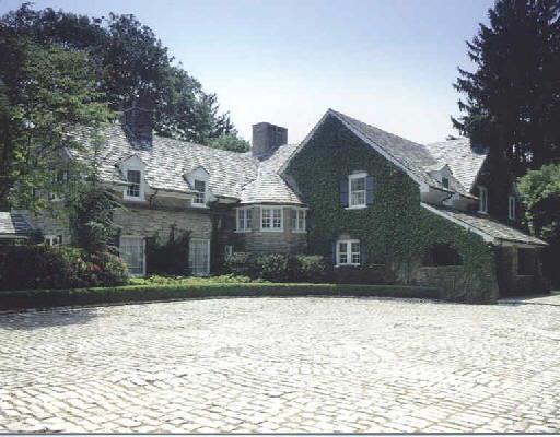 5 High Ridge Avenue Ridgefield, CT 06877 - Photo 1 of 1 a front view of a house with a yard