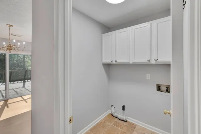 a view of cabinets and wooden floor