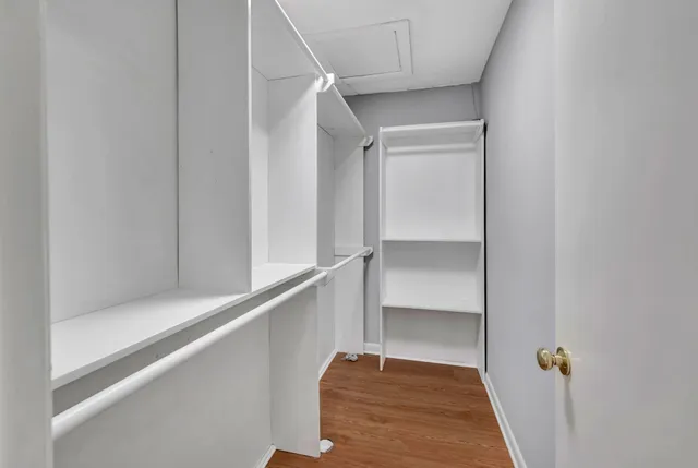a view of an empty walk in closet