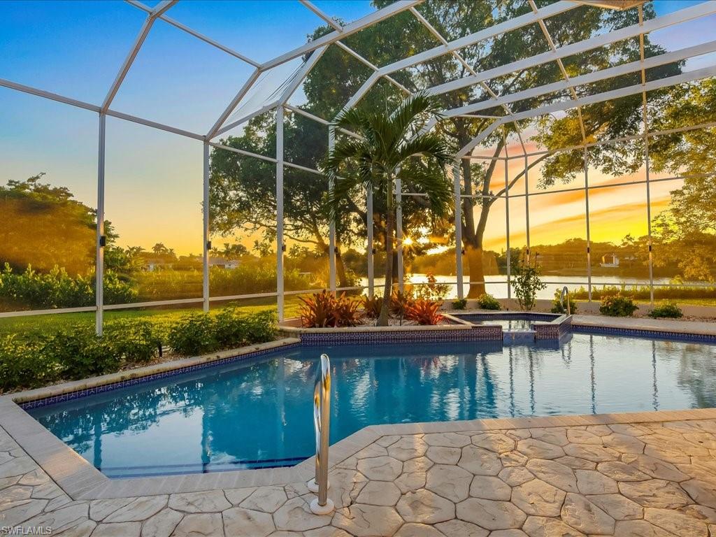 2115 Imperial Golf Course Boulevard Naples, FL 34110 - Photo 41 of 50 a view of a lake