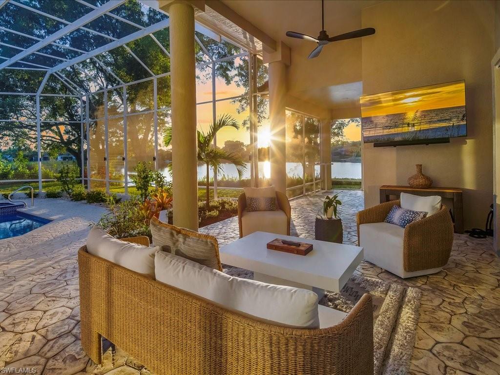 2115 Imperial Golf Course Boulevard Naples, FL 34110 - Photo 42 of 50 a outdoor living space with furniture and a window