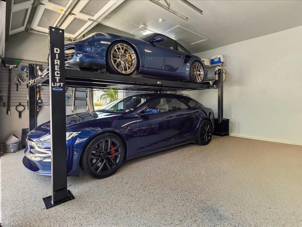 2115 Imperial Golf Course Boulevard Naples, FL 34110 - Photo 44 of 50 a view of a car garage