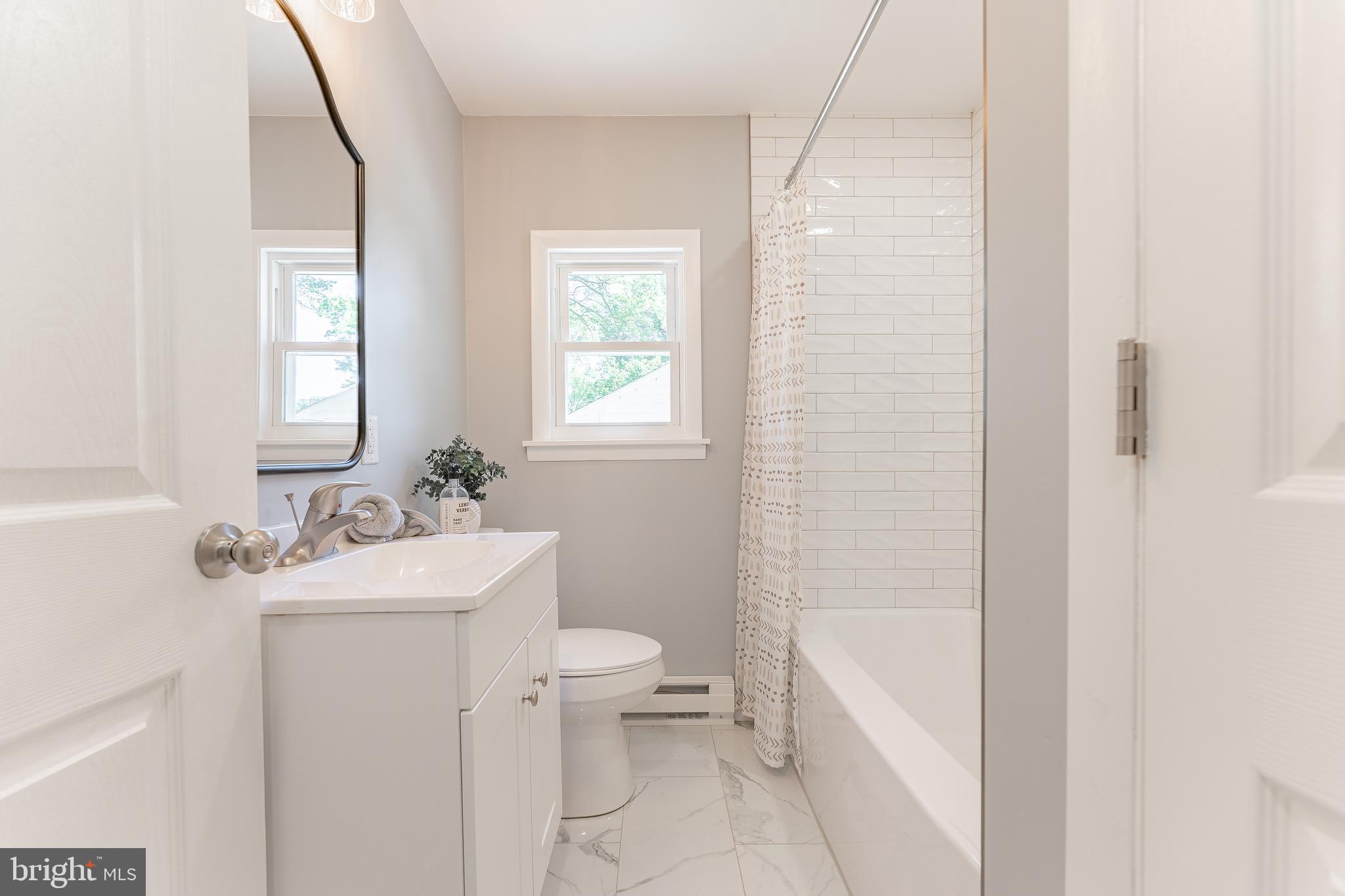 515 Park Road Spring City, PA 19475 - Photo 23 of 38 a bathroom with a sink toilet and shower