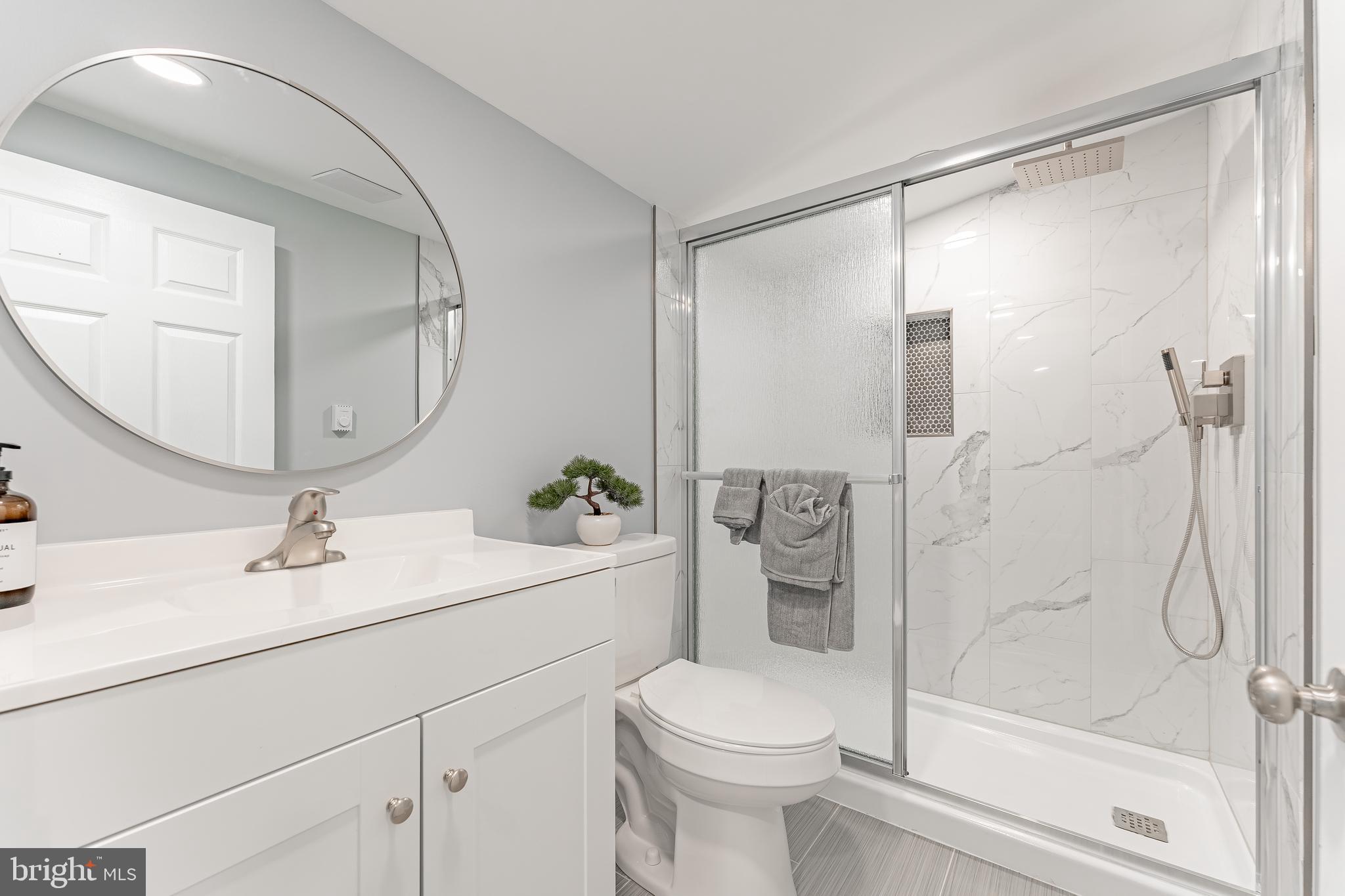 515 Park Road Spring City, PA 19475 - Photo 29 of 38 a bathroom with a sink toilet and shower