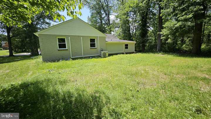 515 Park Road Spring City, PA 19475 - Photo 5 of 38 a backyard of a house with plants and tree