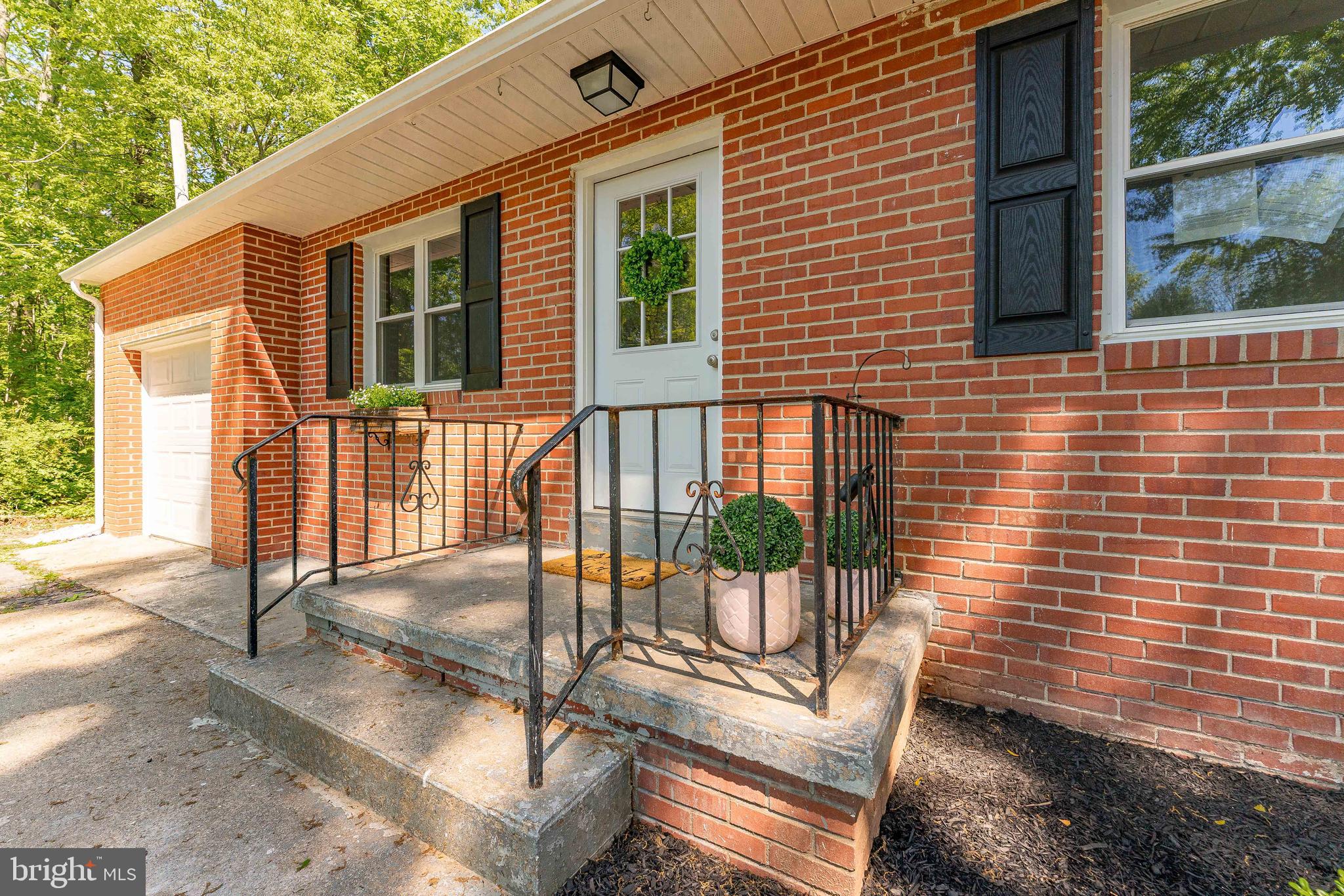 515 Park Road Spring City, PA 19475 - Photo 7 of 38 a view of a house with a patio