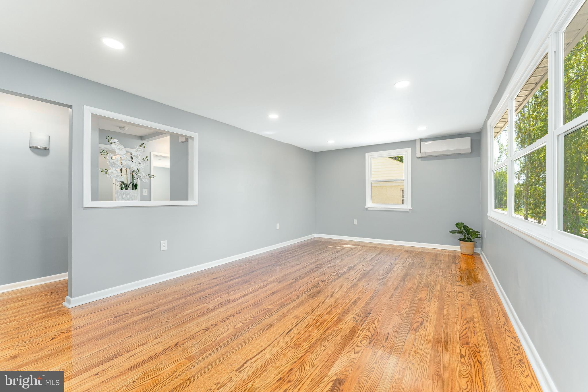 515 Park Road Spring City, PA 19475 - Photo 8 of 38 a view of empty room with wooden floor and fan
