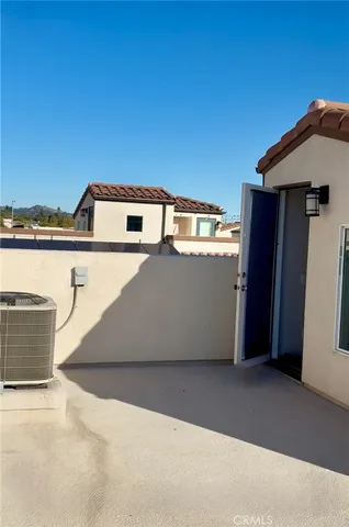 a view of a house with a roof deck