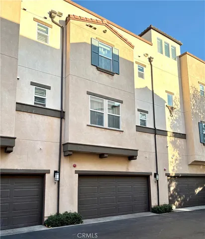 a front view of a building with a road