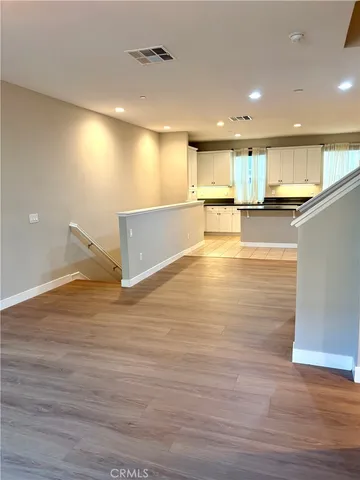 a view of kitchen view with wooden floor