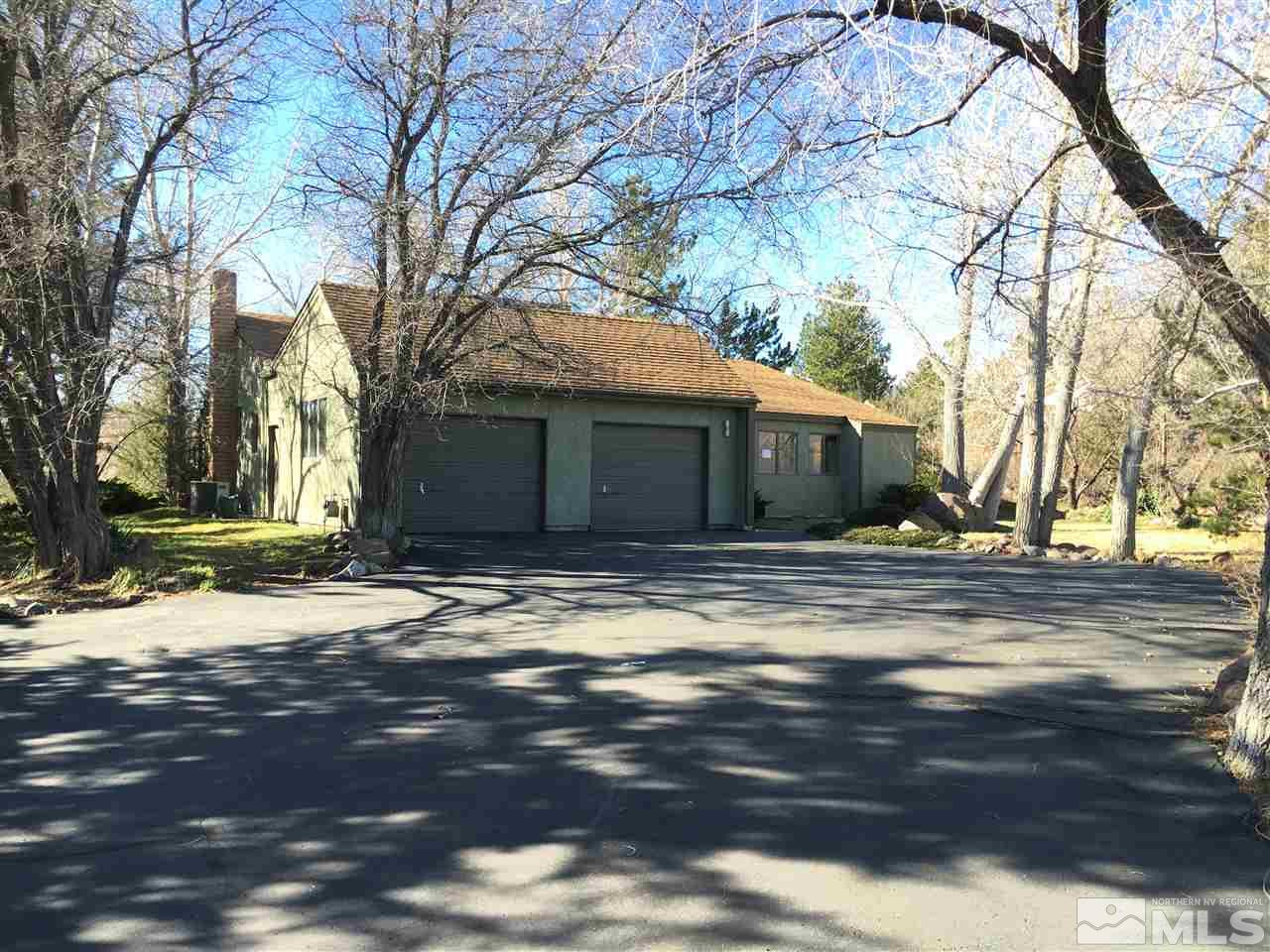 15230 Broili Drive Reno, NV 89511 - Photo 1 of 1 a view of a yard in front of a house