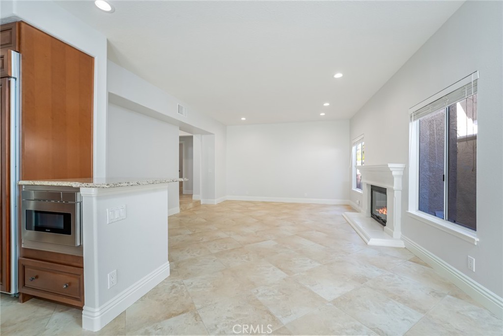19 Springbrook Road Laguna Niguel, CA 92677 - Photo 15 of 50 a view of a kitchen with furniture and an empty room