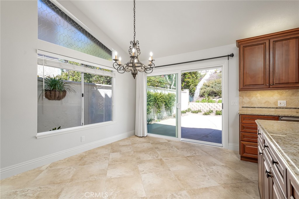 19 Springbrook Road Laguna Niguel, CA 92677 - Photo 16 of 50 a view of a kitchen with a sink and cabinets
