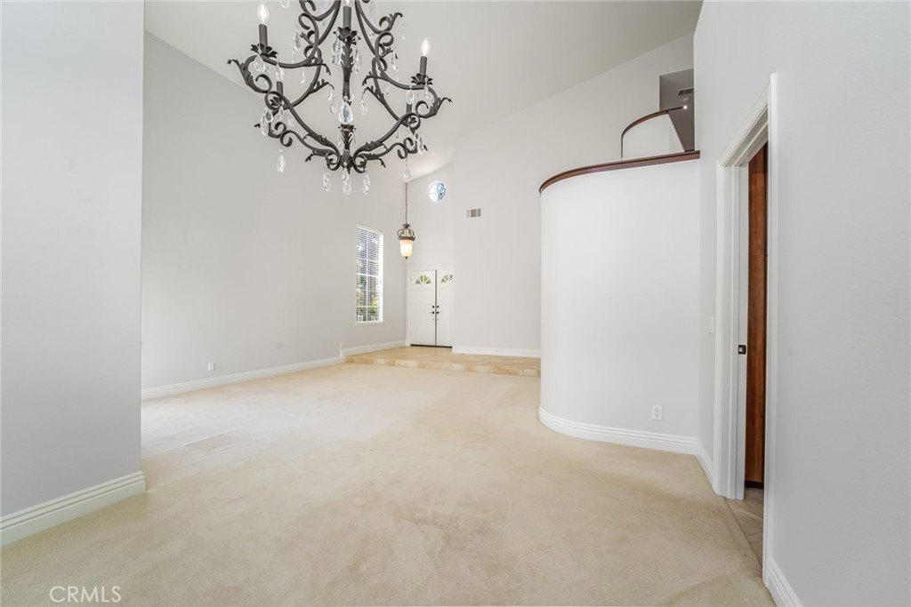 19 Springbrook Road Laguna Niguel, CA 92677 - Photo 10 of 50 a view of a room with a hanging light and kitchen