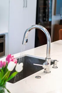 a view of a kitchen and dining room