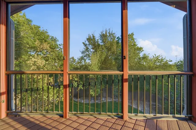 a view of a street from a balcony