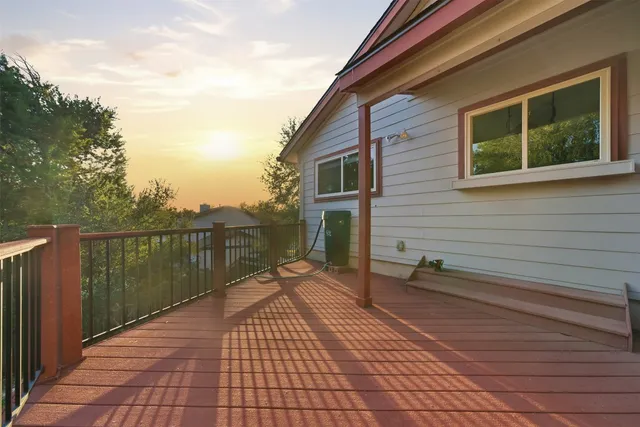 a view of a terrace with wooden floor and outdoor space