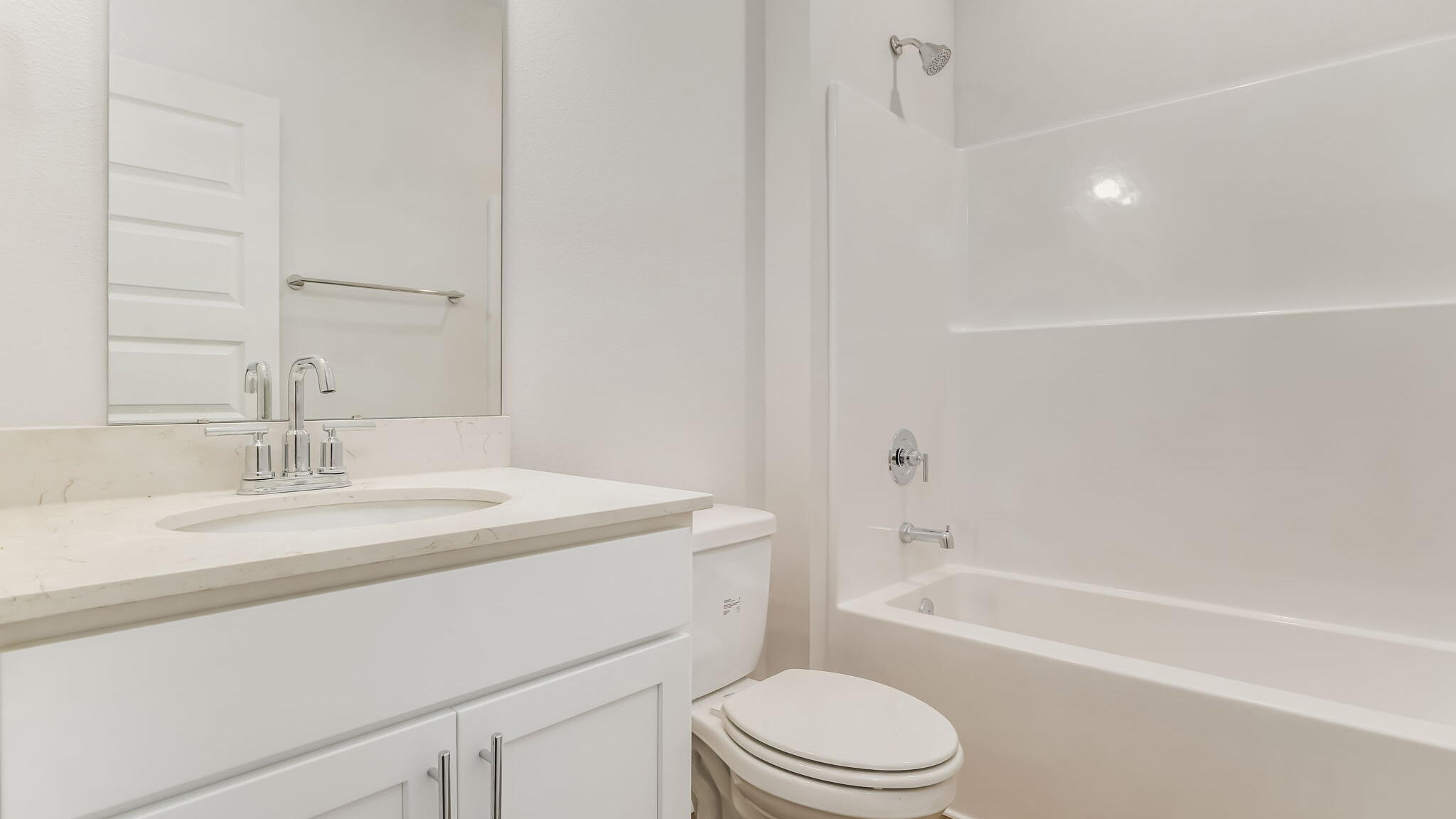5619 Thatcher Road Crestview, FL 32539 - Photo 26 of 32 a bathroom with a granite countertop sink toilet and shower