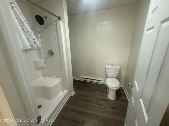 a bathroom with a sink and a shower