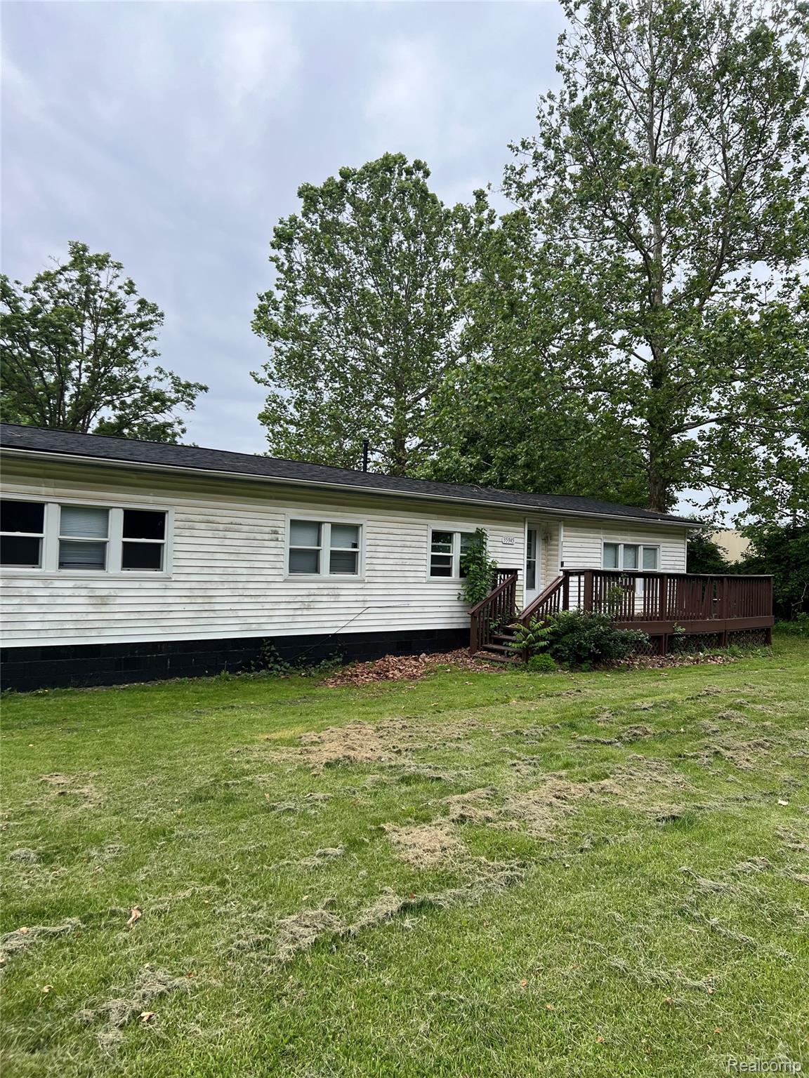 35945 Herman Street Romulus, MI 48174 - Photo 26 of 26 Rear view of property with a yard and a deck