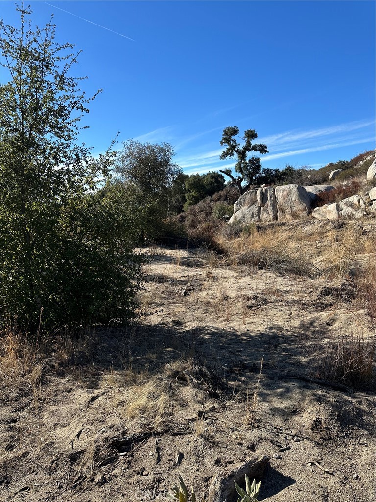 0 Avenida Sierra Rojo Road Hemet, CA 92544 - Photo 10 of 10 a view of a beach with a yard