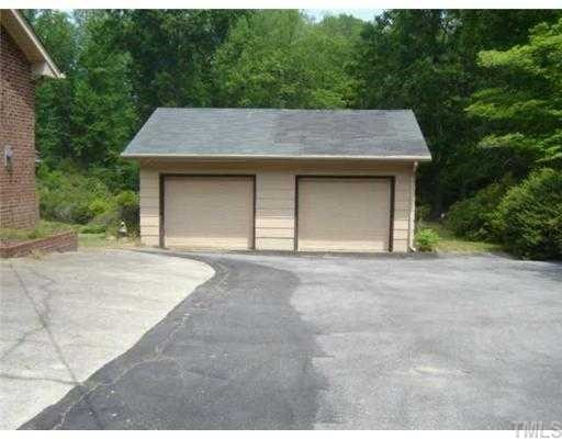 148 Stagecrest Drive Raleigh, NC 27603 - Photo 4 of 12 Additional detached garage with plenty of space for parking. Parking Lot/Garage