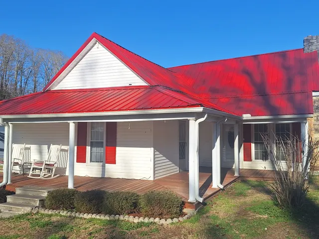 a kitchen with a refrigerator and a sink
