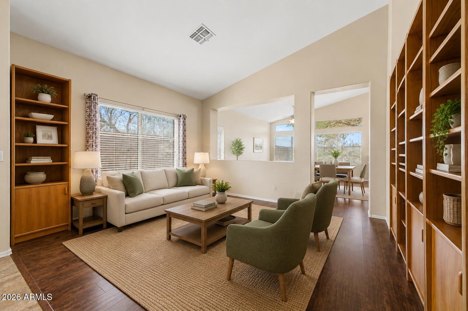 40602 North Apollo Way Anthem, AZ 85086 - Photo 7 of 38 a living room with furniture and a window