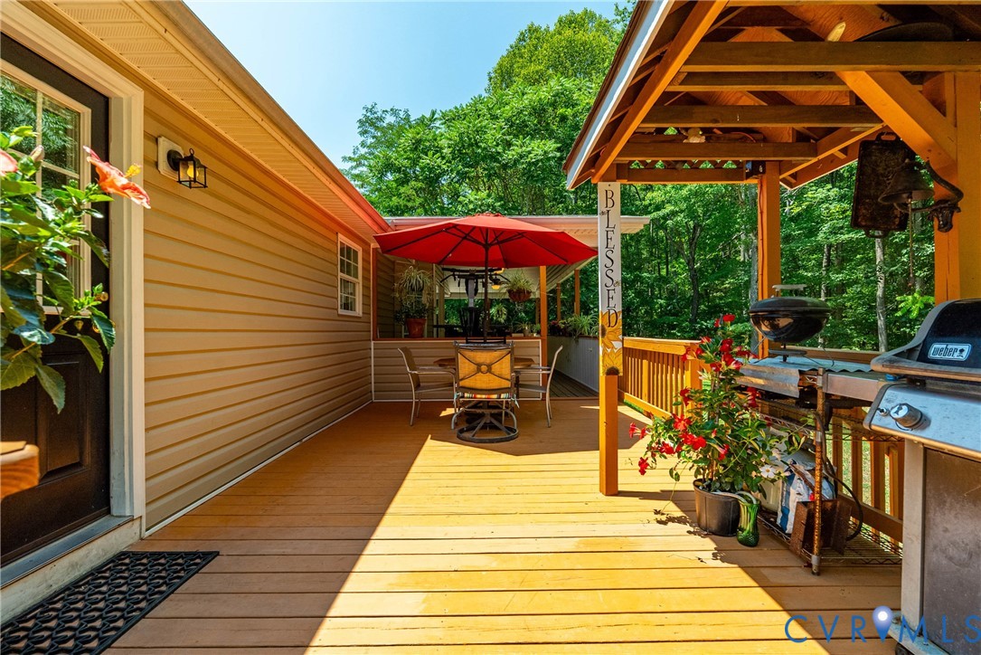 197 Goshen Road Cumberland, VA 23040 - Photo 57 of 70 Expansive wood deck with a built-in pergola struct