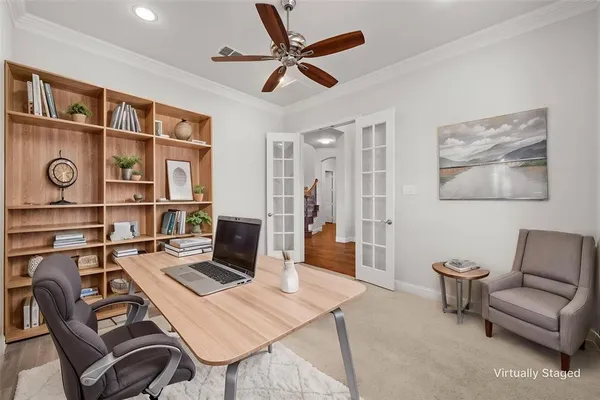 a workspace with furniture and window