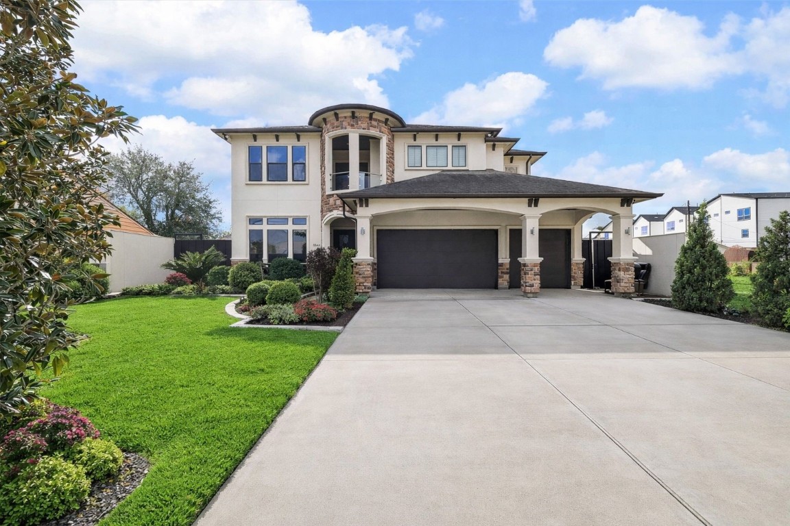 3942 Charleston Street Houston, TX 77021 - Photo 1 of 34 a front view of a house with garden