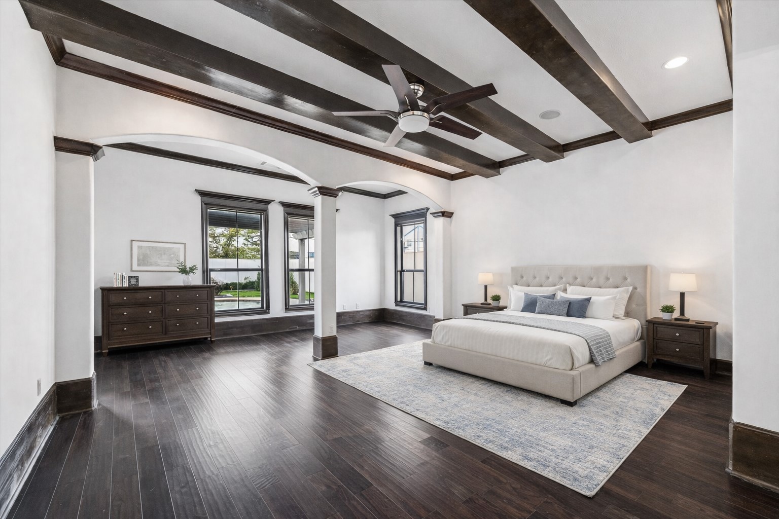3942 Charleston Street Houston, TX 77021 - Photo 13 of 34 a spacious bedroom with a bed couch and a window