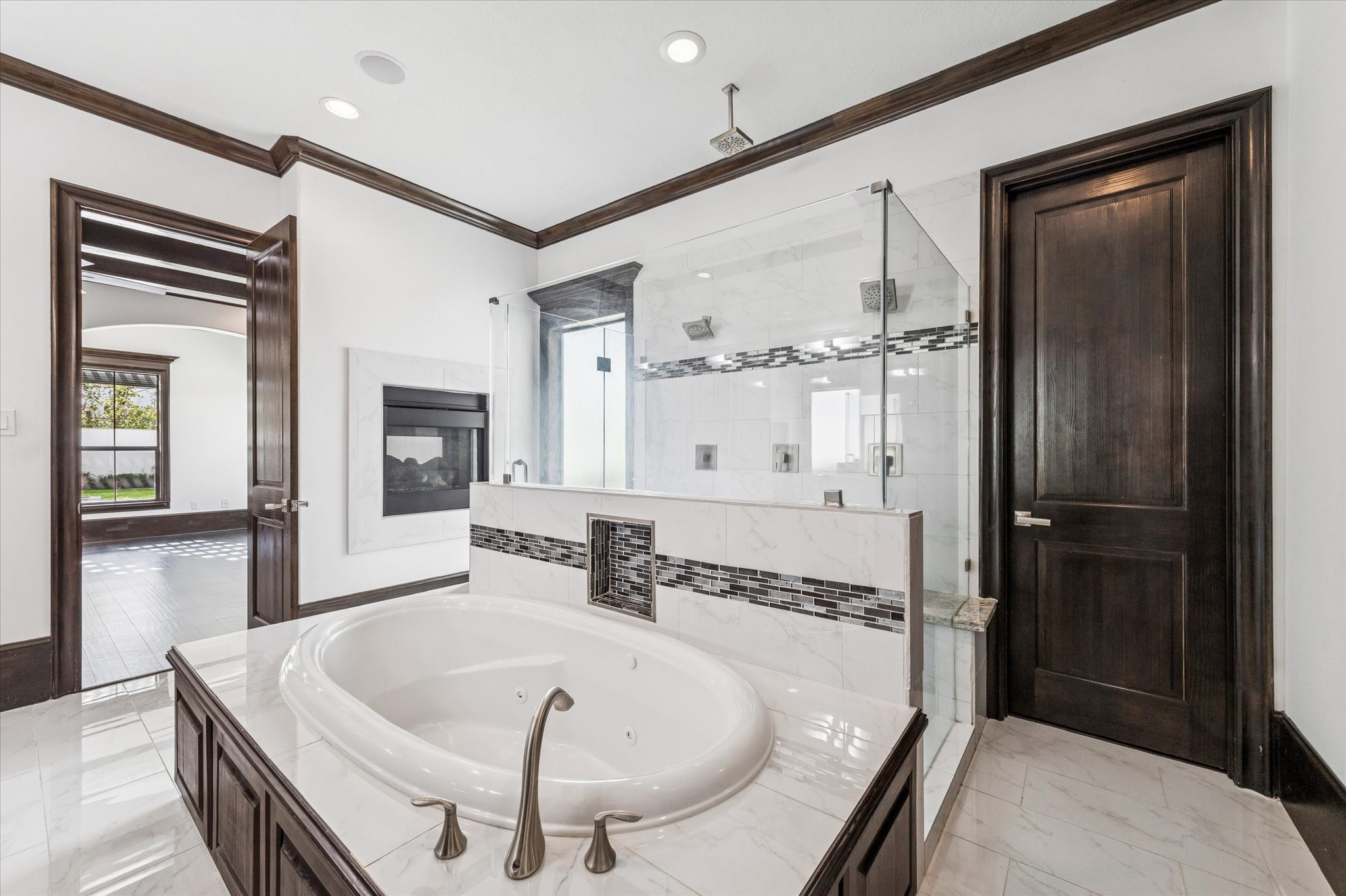 3942 Charleston Street Houston, TX 77021 - Photo 15 of 34 a spacious bathroom with a tub and a shower