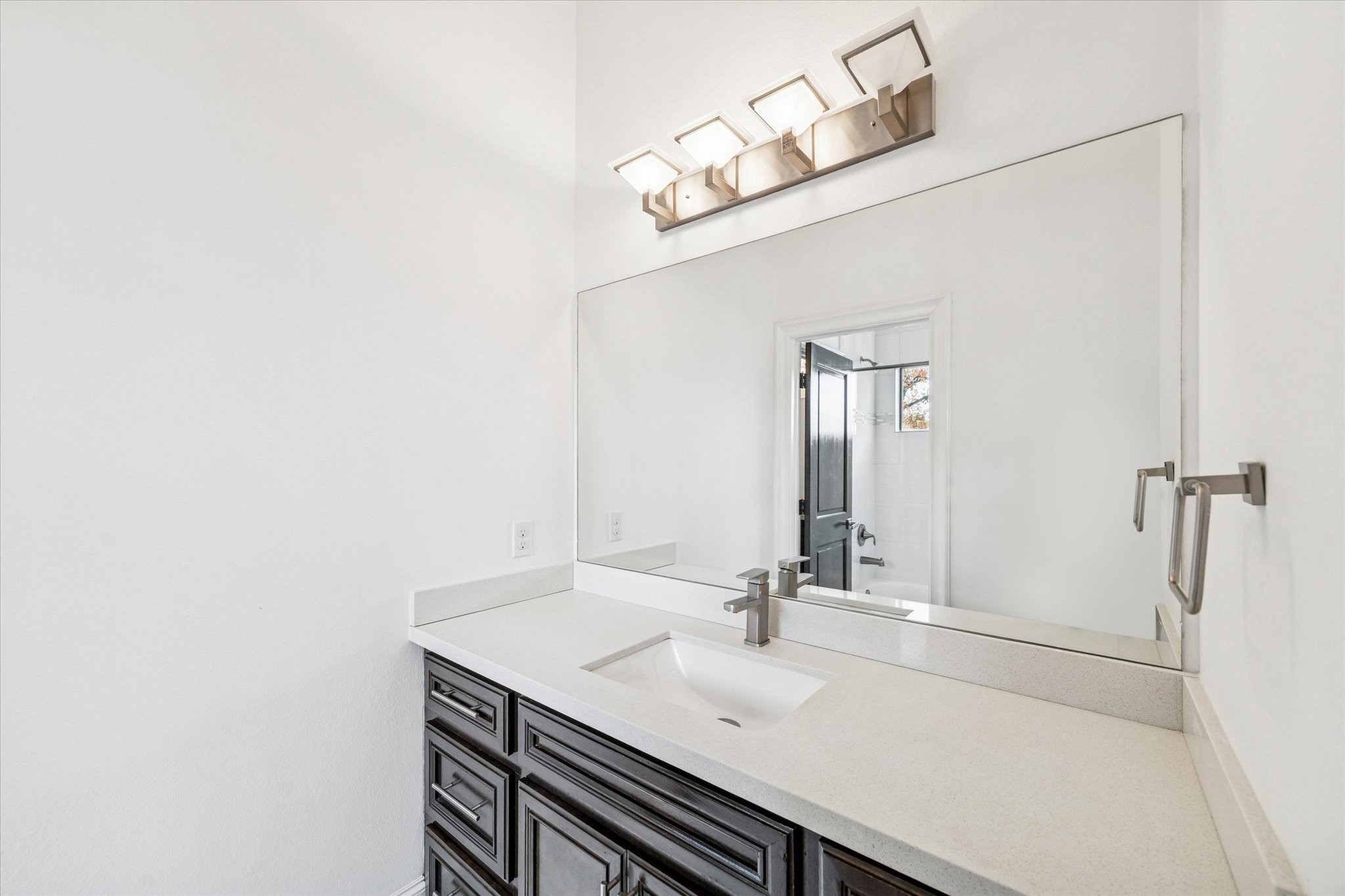 3942 Charleston Street Houston, TX 77021 - Photo 25 of 34 a bathroom with a sink and a mirror