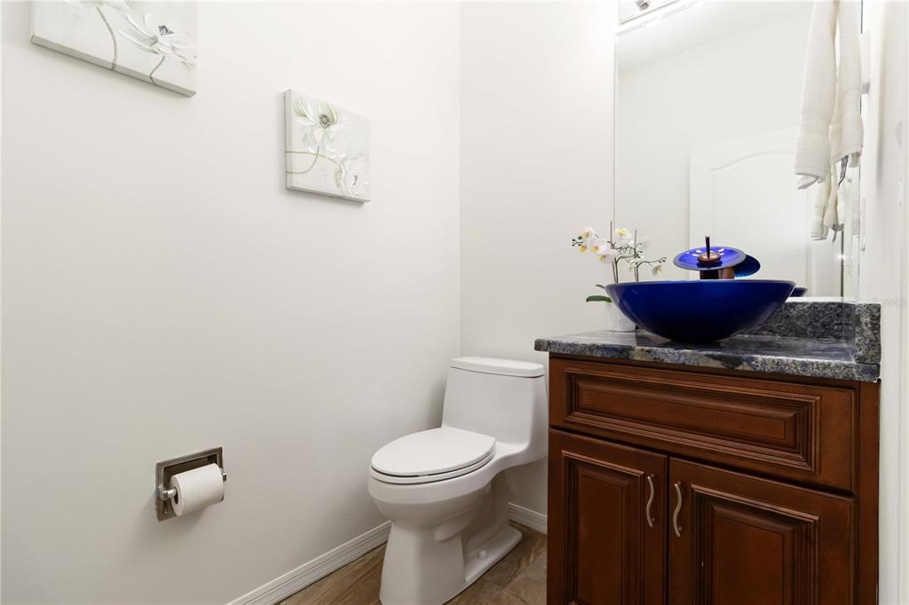 4223 Balmoral Way Sarasota, FL 34238 - Photo 19 of 72 a view of a toilet in bathroom