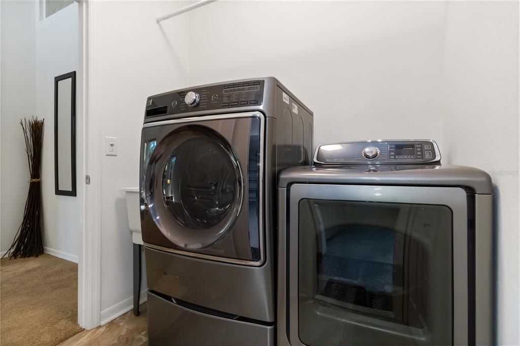 4223 Balmoral Way Sarasota, FL 34238 - Photo 20 of 72 a utility room with dryer and washer