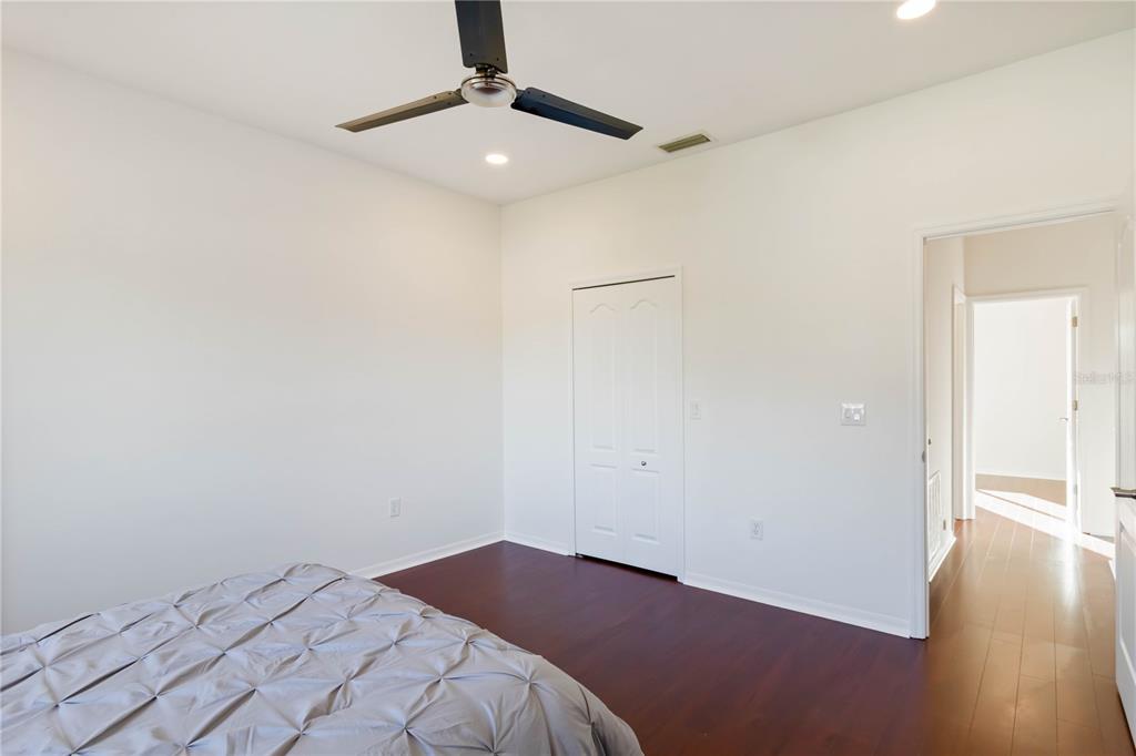 4223 Balmoral Way Sarasota, FL 34238 - Photo 36 of 72 an empty room with wooden floor closet and windows