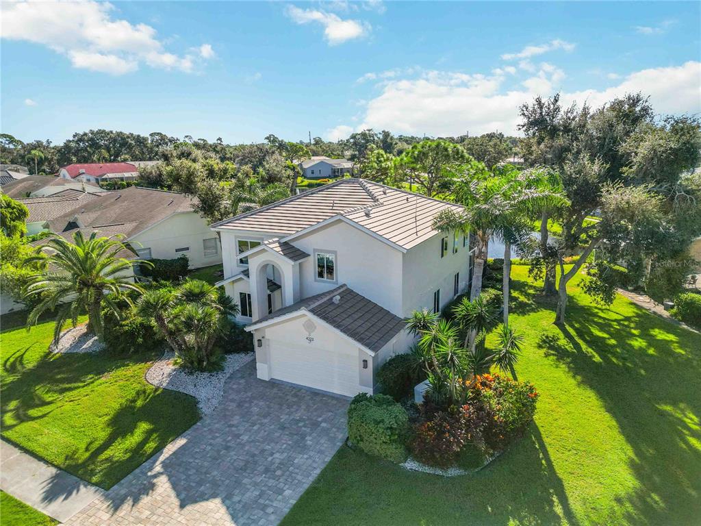 4223 Balmoral Way Sarasota, FL 34238 - Photo 50 of 72 a picture of a house with a garden