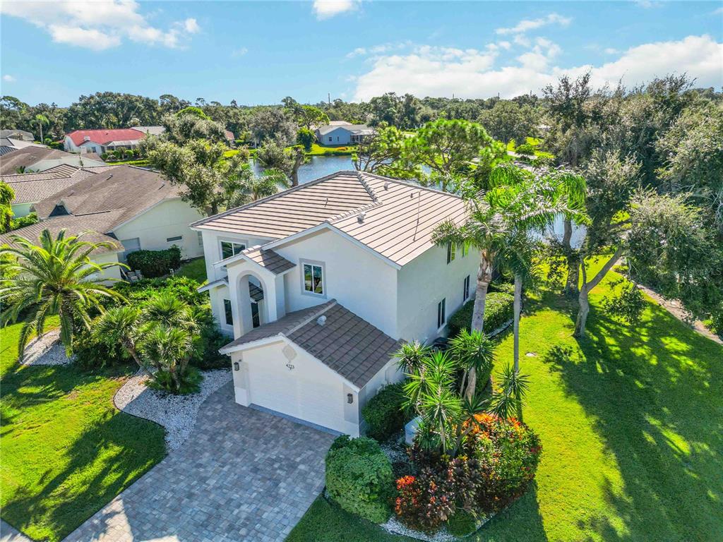 4223 Balmoral Way Sarasota, FL 34238 - Photo 57 of 72 an aerial view of a house with a garden