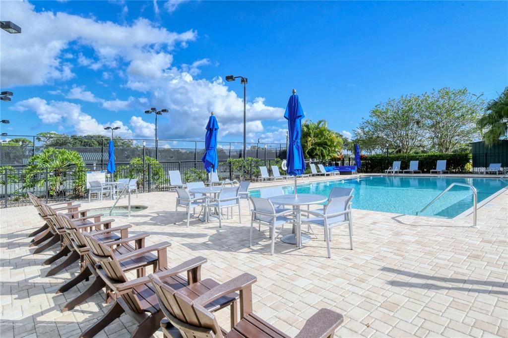 4223 Balmoral Way Sarasota, FL 34238 - Photo 66 of 72 a view of a patio with a table and chairs