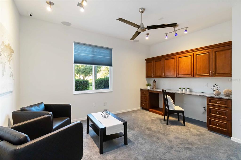 4223 Balmoral Way Sarasota, FL 34238 - Photo 10 of 72 a work room with furniture and a window