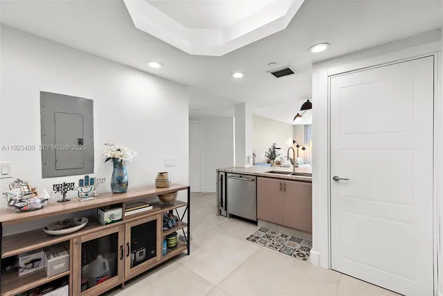 a bathroom with a sink double vanity and a mirror
