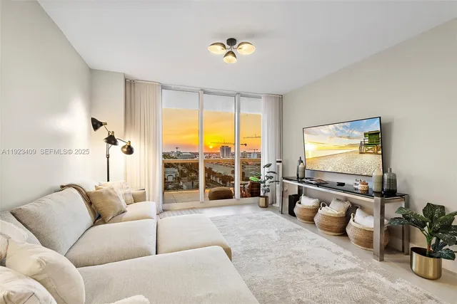 a living room with furniture large window with outer view