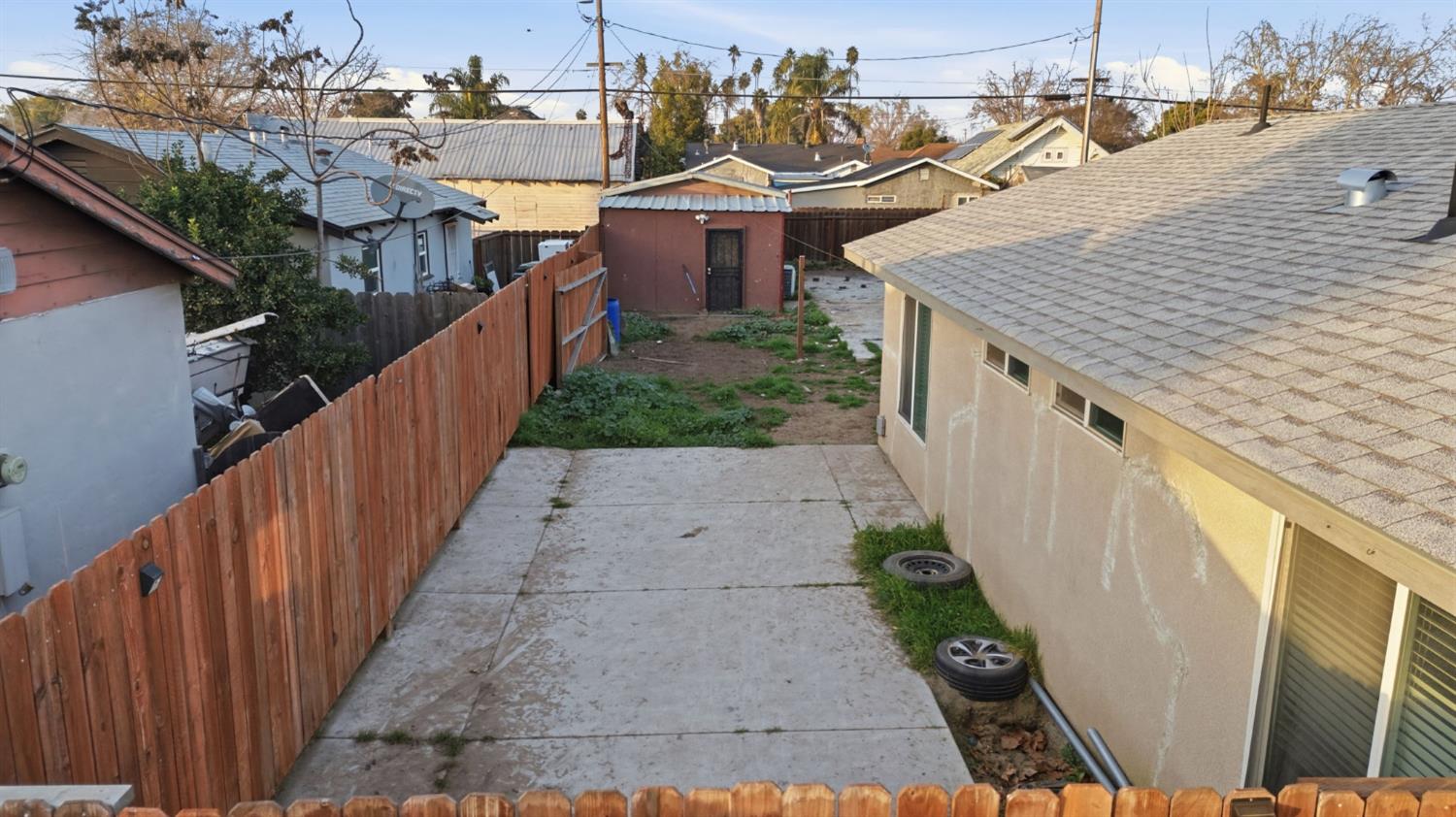 243 Angelus Street Turlock, CA 95380 - Photo 22 of 26 a view of a terrace with wooden walls